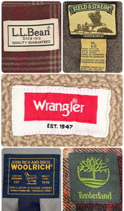 Close-up of vintage flannel shirt labels, including L.L.Bean, Wrangler, Woolrich, and Timberland patches.